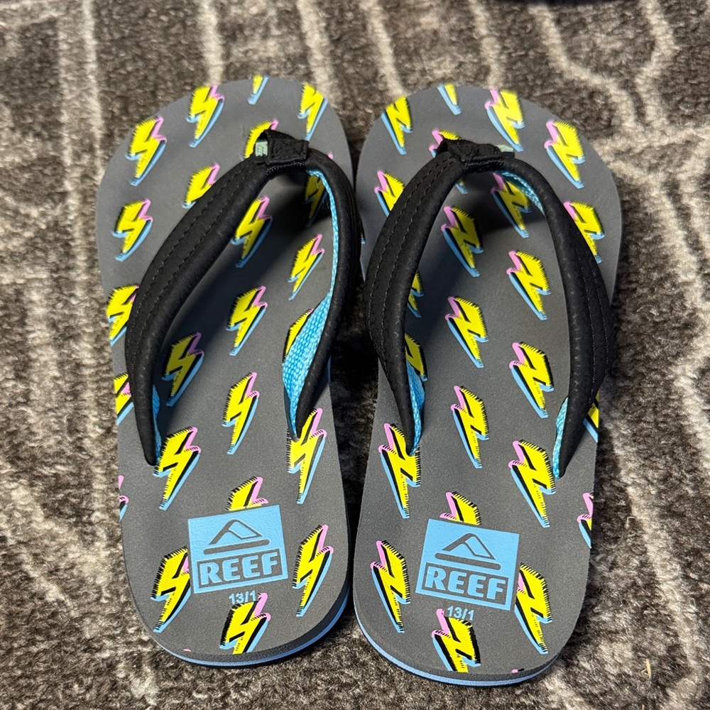 Reef Gray Flip Flops with Colorful Lightning Bolts